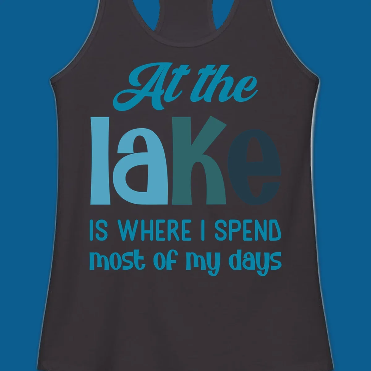 Typography design with the phrase "At the lake is where I spend most of my days".