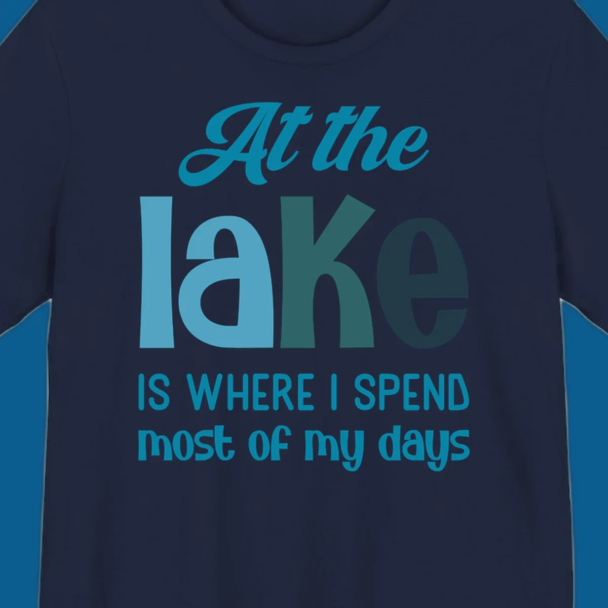 Typography design with the phrase "At the lake is where I spend most of my days".