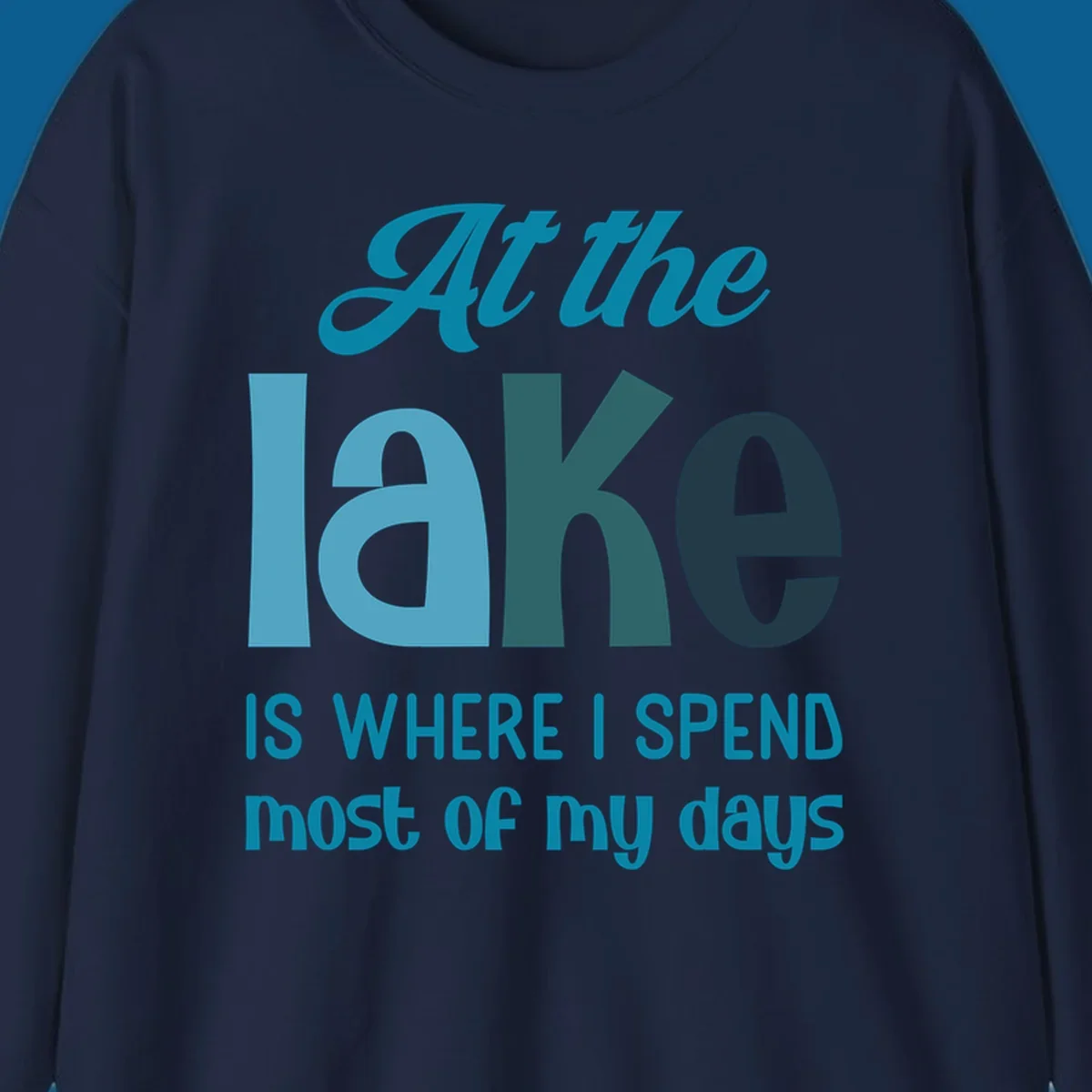 Typography design with the phrase "At the lake is where I spend most of my days".