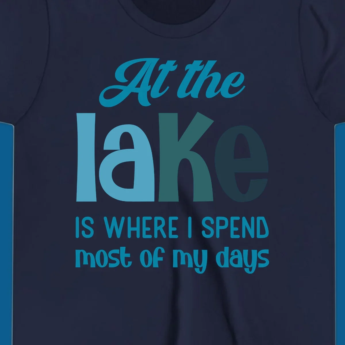 Typography design with the phrase "At the lake is where I spend most of my days".