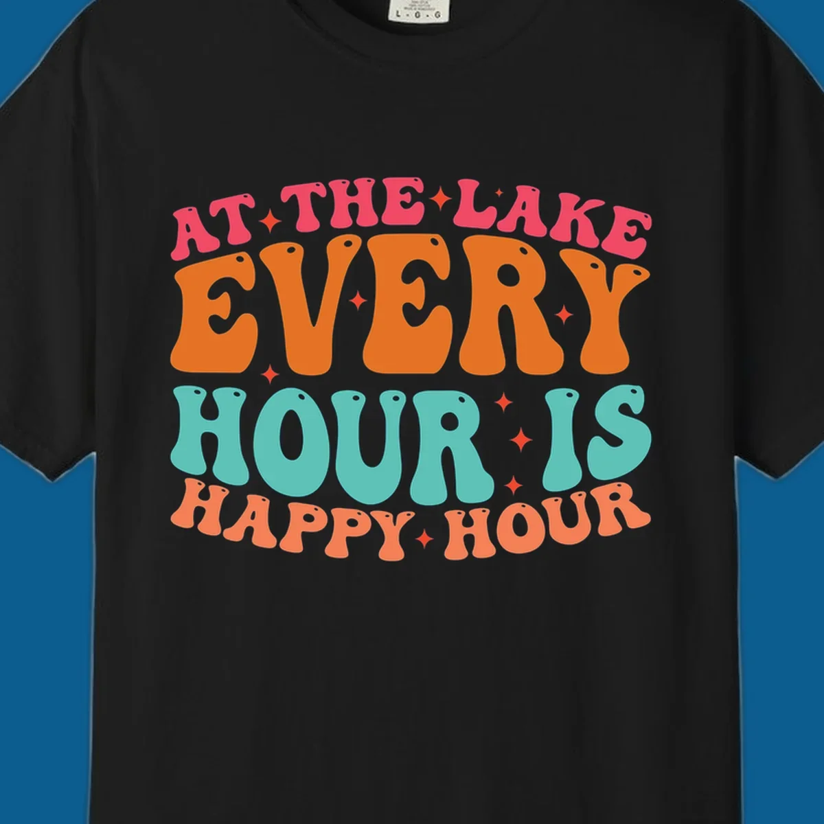 Retro text design that says "AT THE LAKE EVERY HOUR IS HAPPY HOUR" with starbursts, lake happy hour concept.