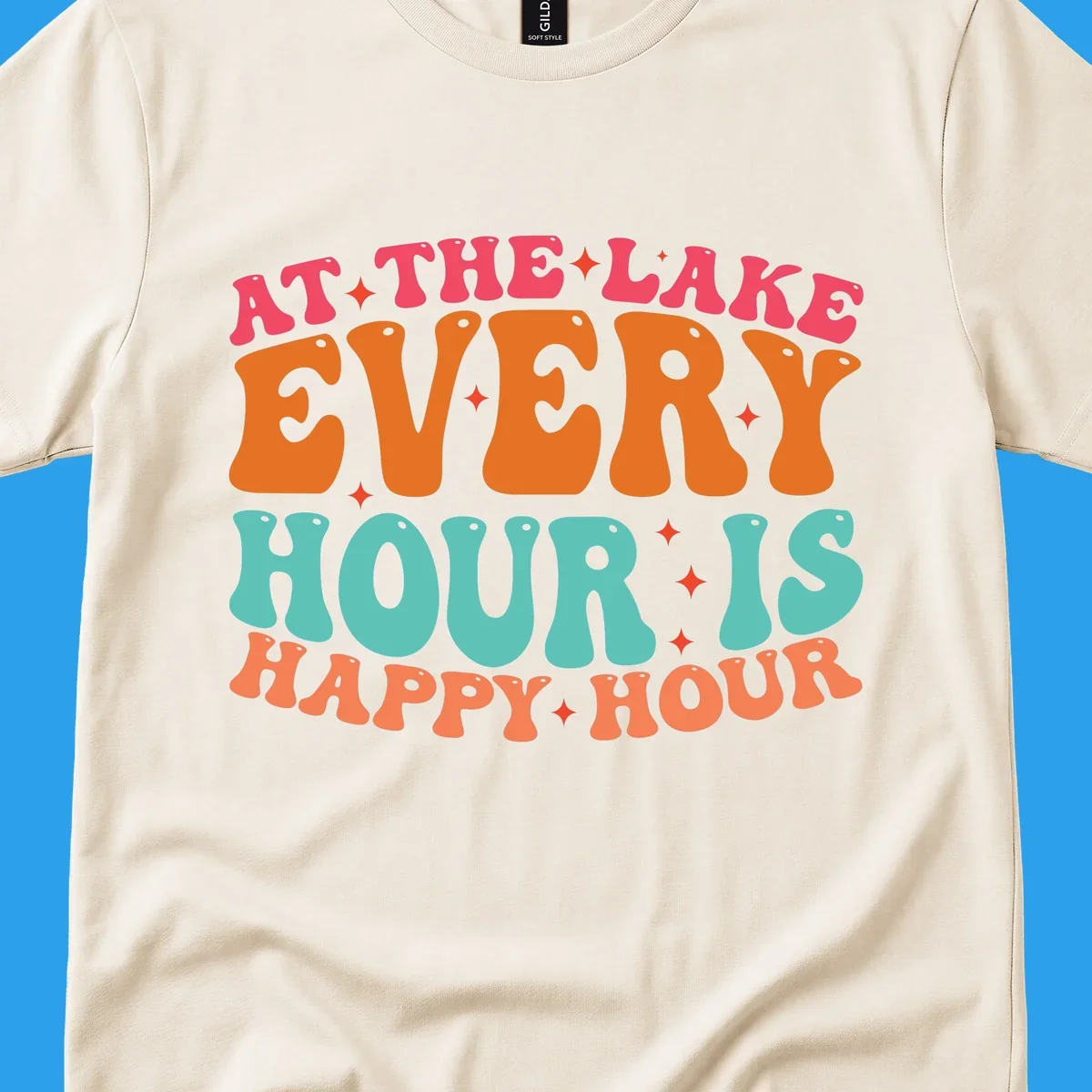 Retro text design that says "AT THE LAKE EVERY HOUR IS HAPPY HOUR" with starbursts, lake happy hour concept.