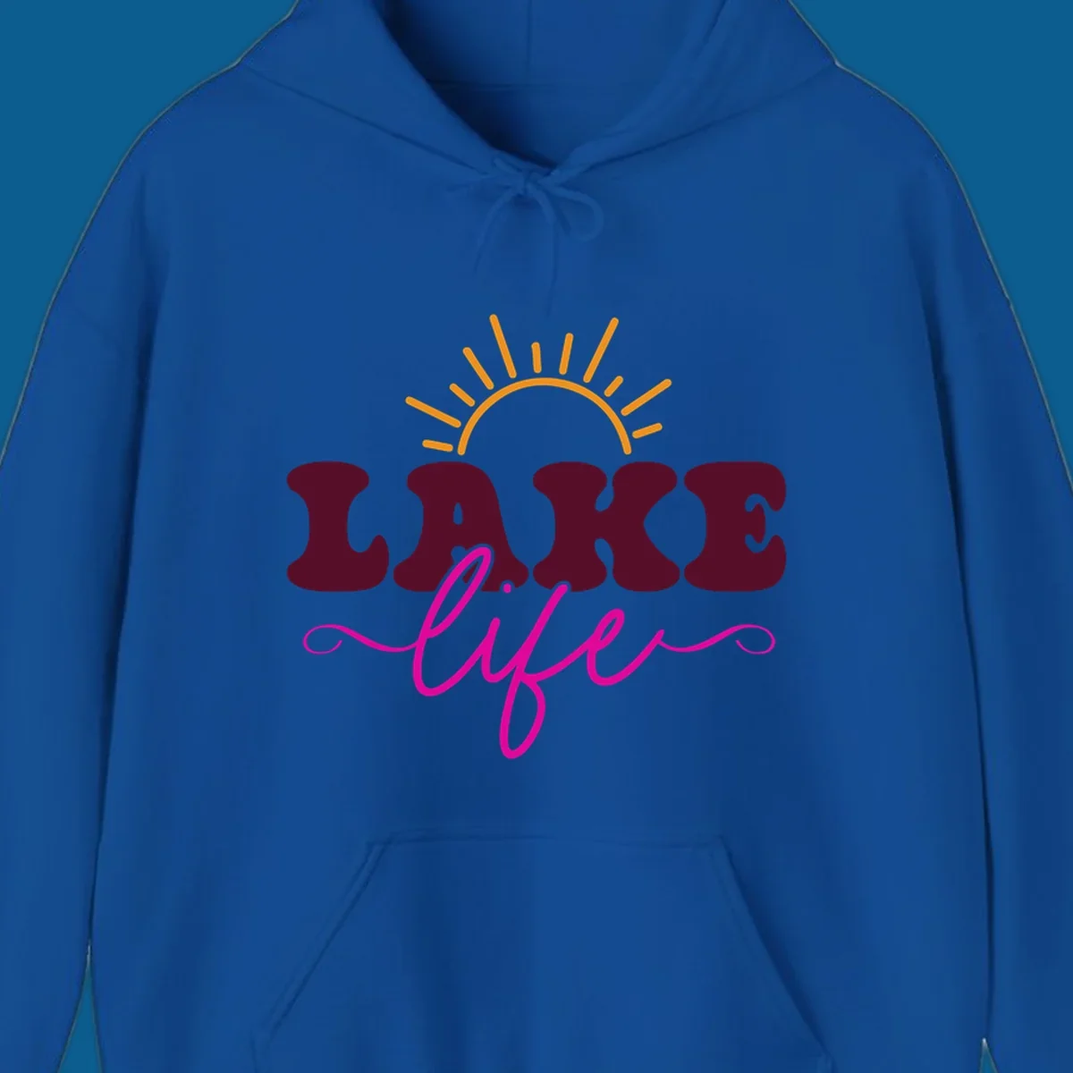 Retro lake life sun graphic with maroon LAKE and pink life text.