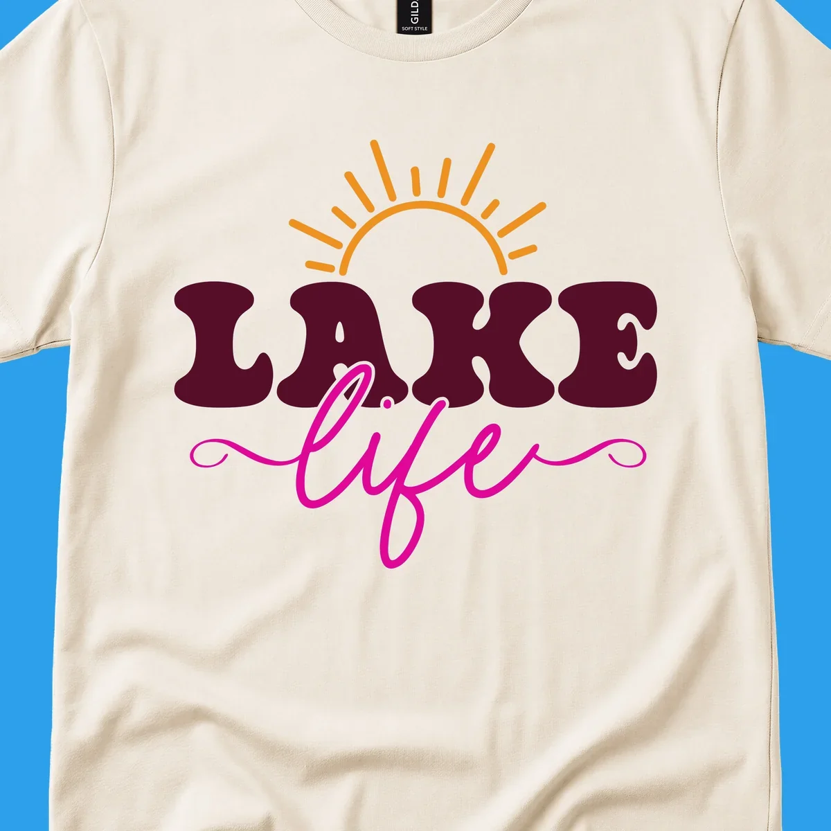 Retro lake life sun graphic with maroon LAKE and pink life text.