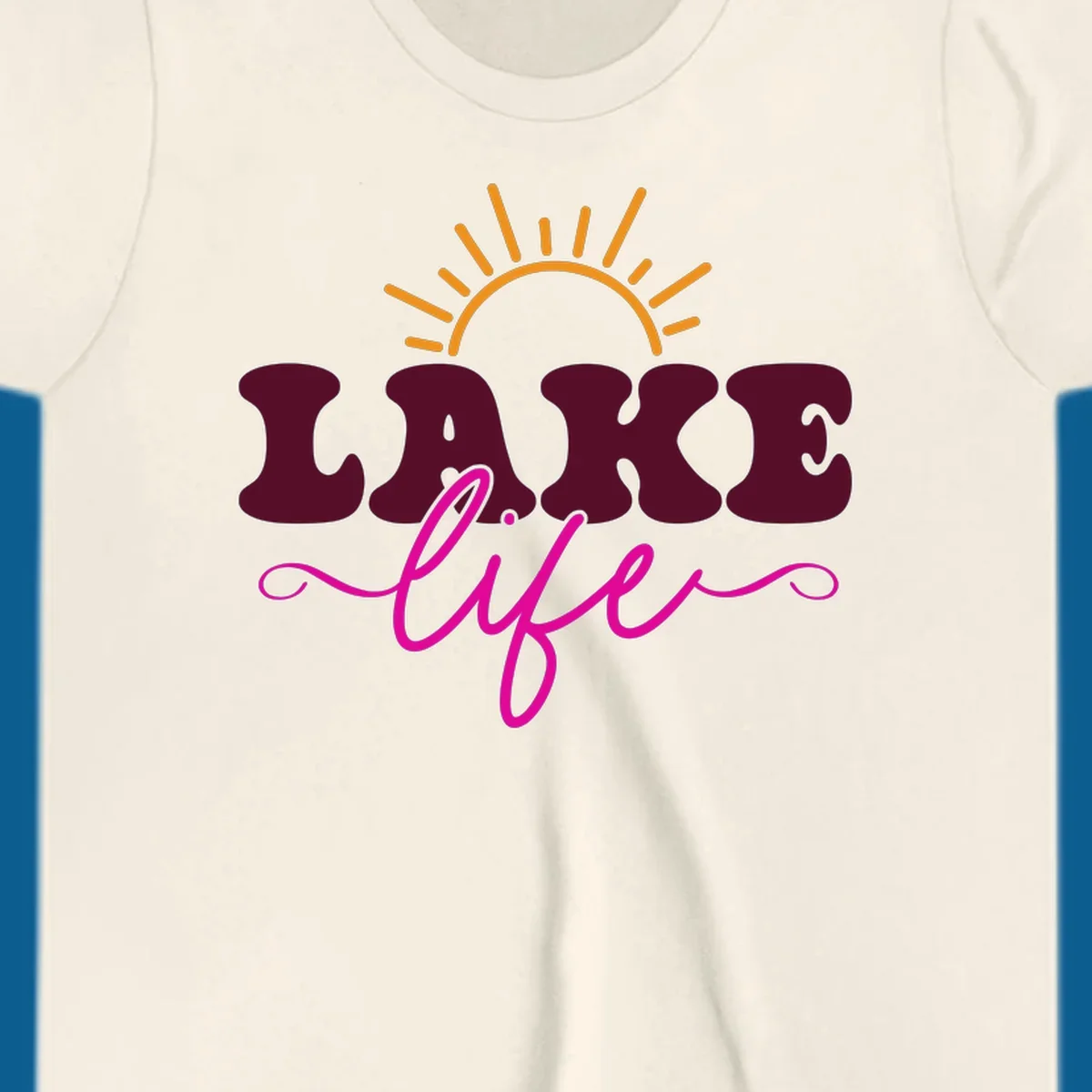 Retro lake life sun graphic with maroon LAKE and pink life text.