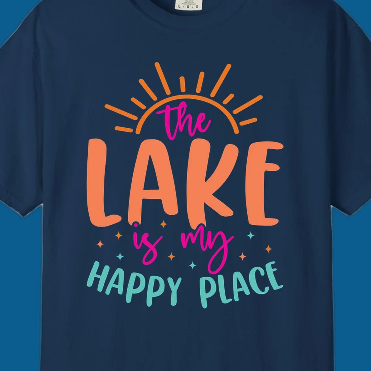 The lake is my happy place text design with sun rays and stars.