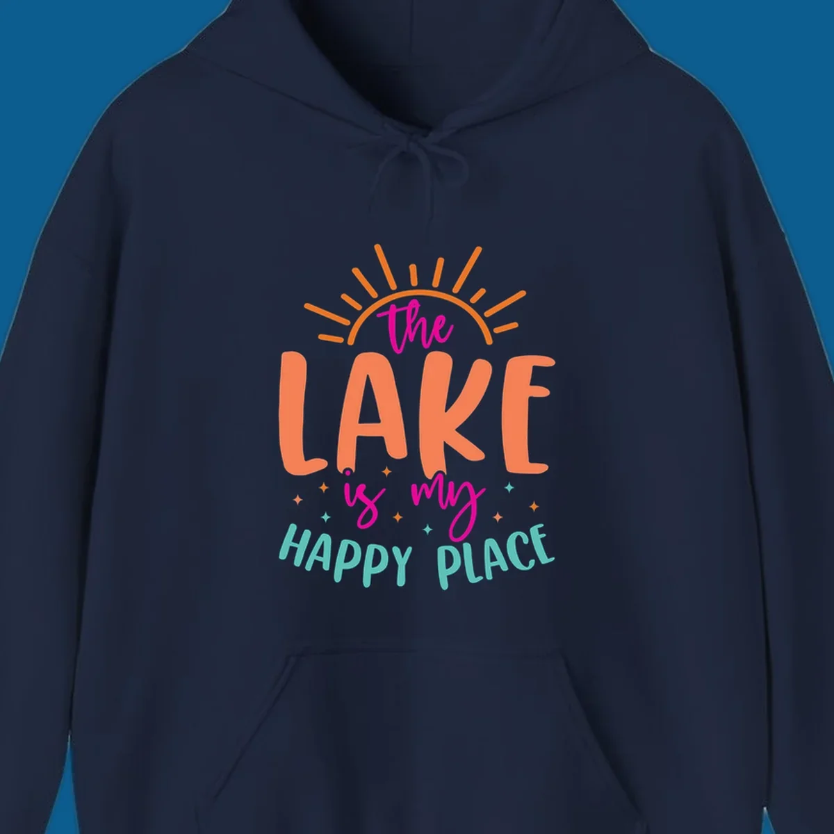 The lake is my happy place text design with sun rays and stars.