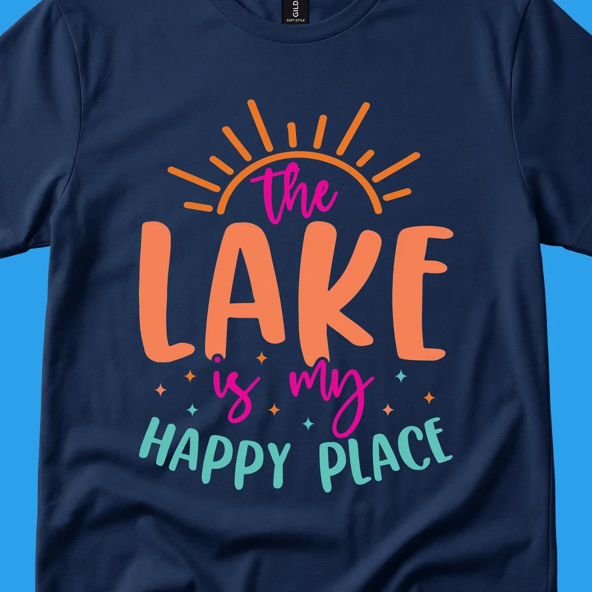 The lake is my happy place text design with sun rays and stars.