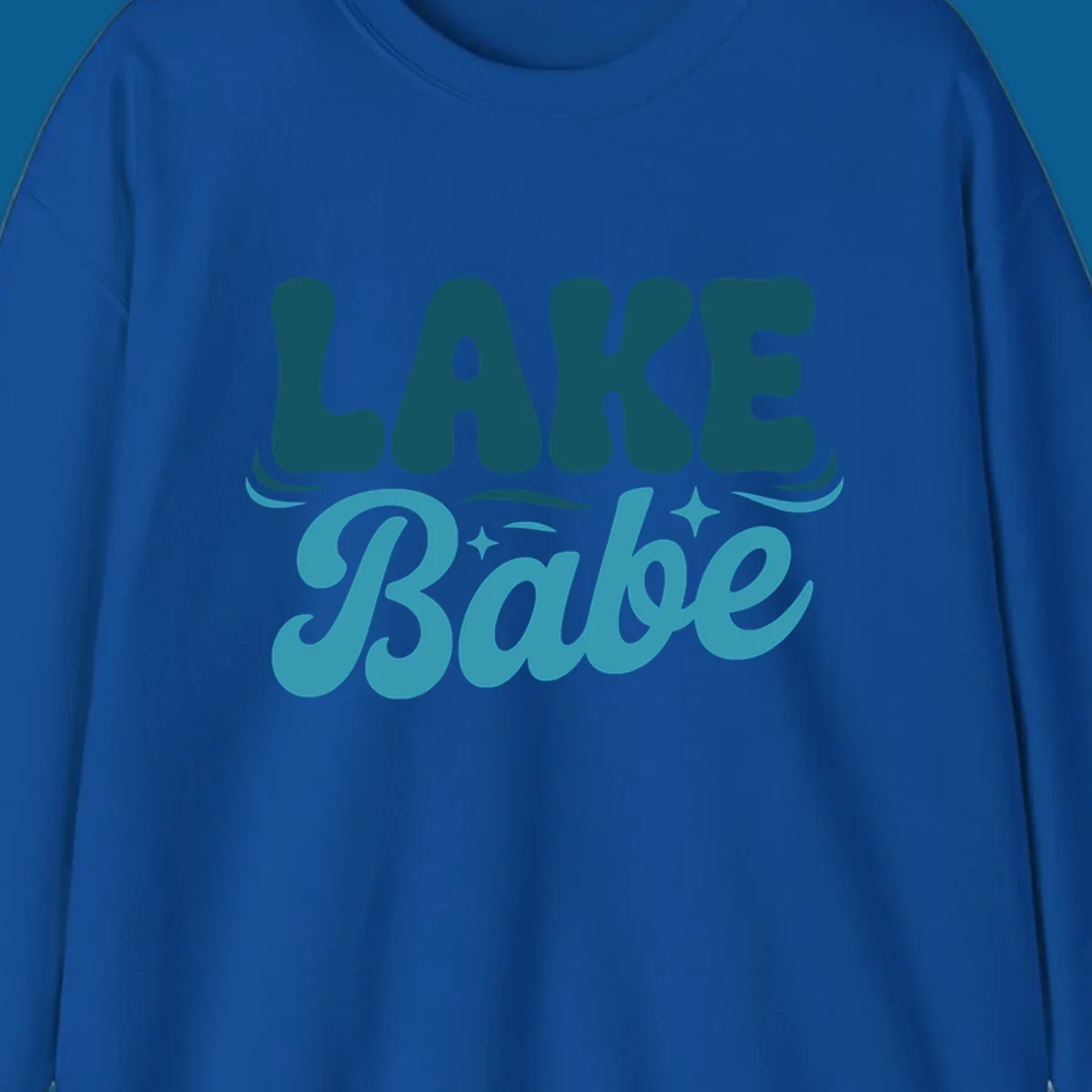 Retro LAKE Babe text design with wavy font and sparkle accents.