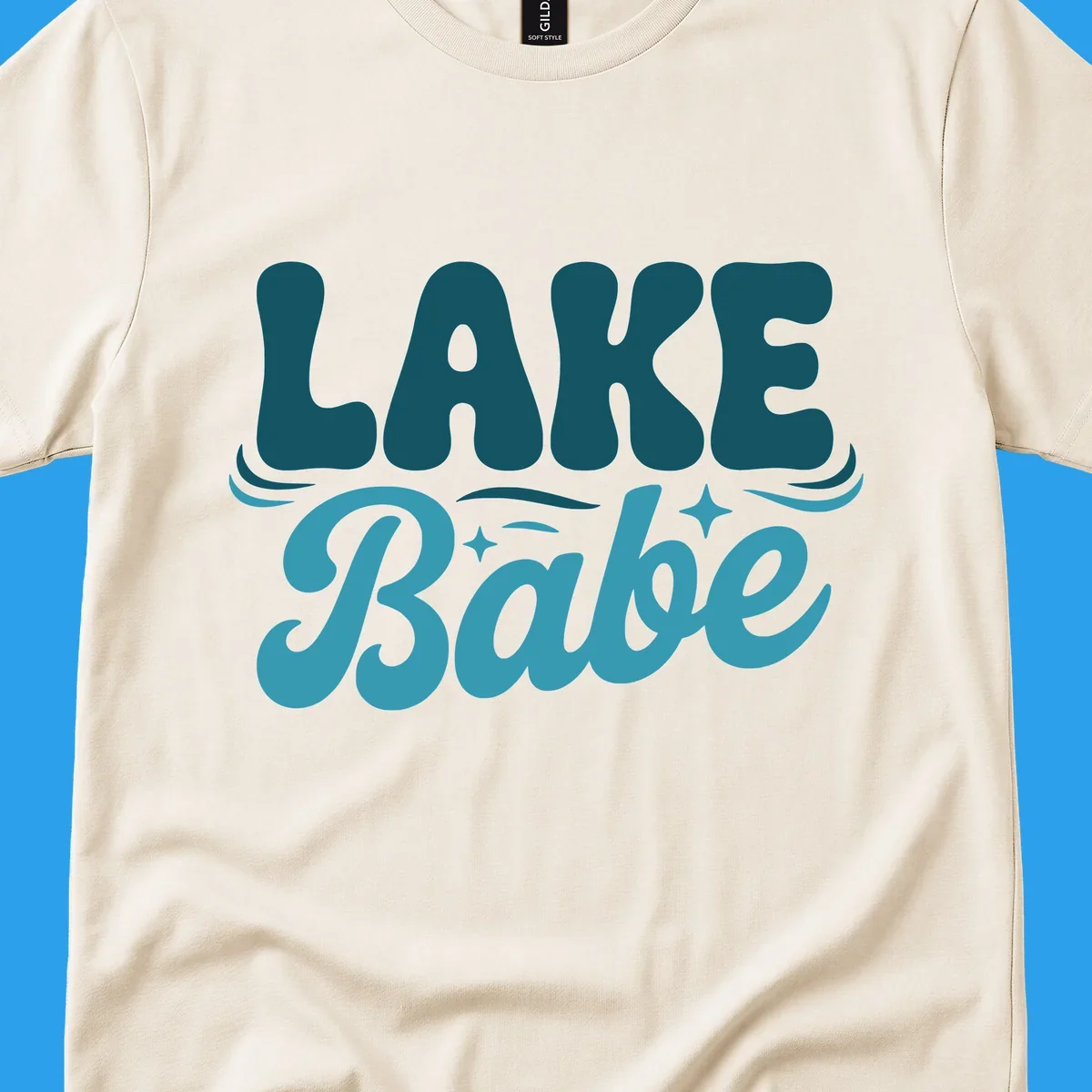 Retro LAKE Babe text design with wavy font and sparkle accents.