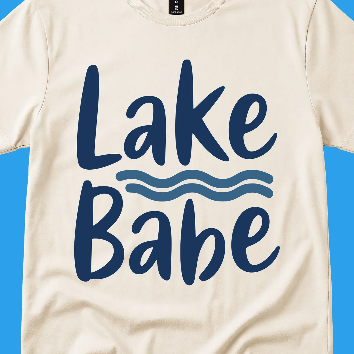 Lake Babe text with blue wavy lines, white font on dark background.