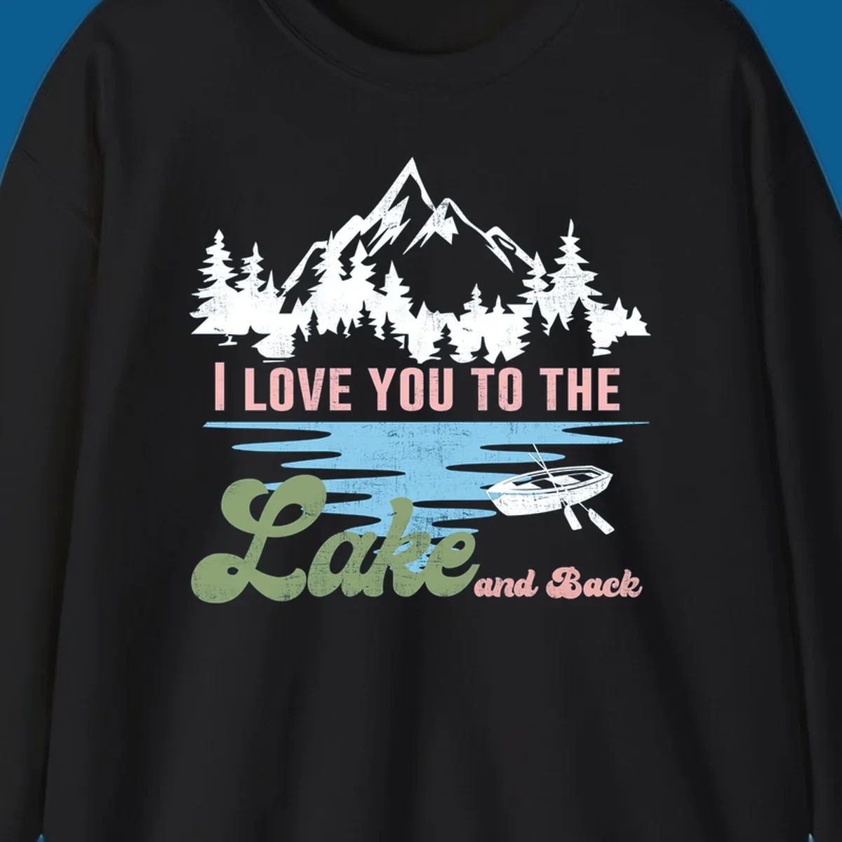 Illustration of mountains, pine trees, and a lake with the text 'I Love You To The Lake And Back', representing lake love escape.