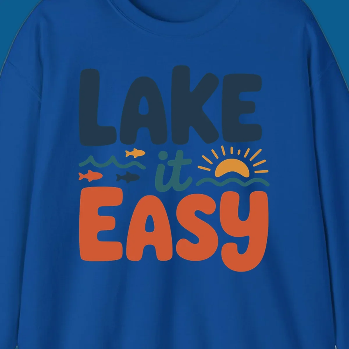 Lake it Easy text with waves, fish, and sun graphic. lake life.