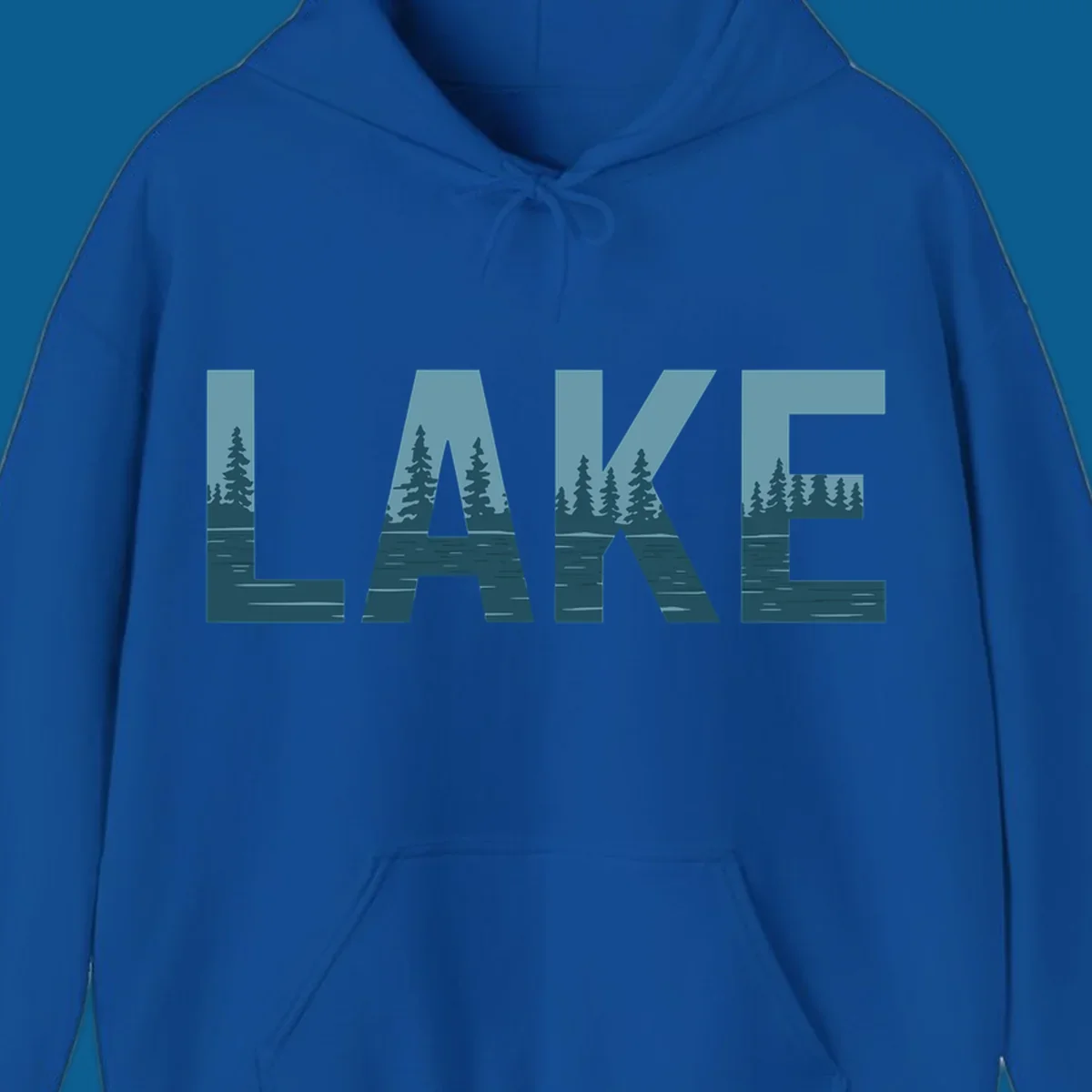The word LAKE filled with a pine tree and lake water landscape. lake-pine-trees.
