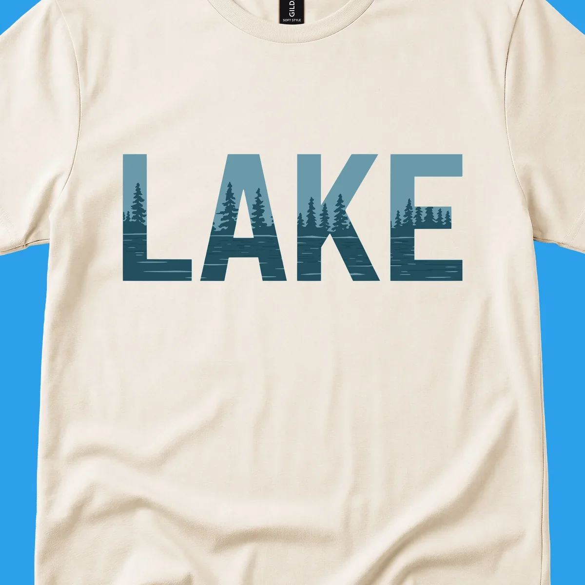 The word LAKE filled with a pine tree and lake water landscape. lake-pine-trees.