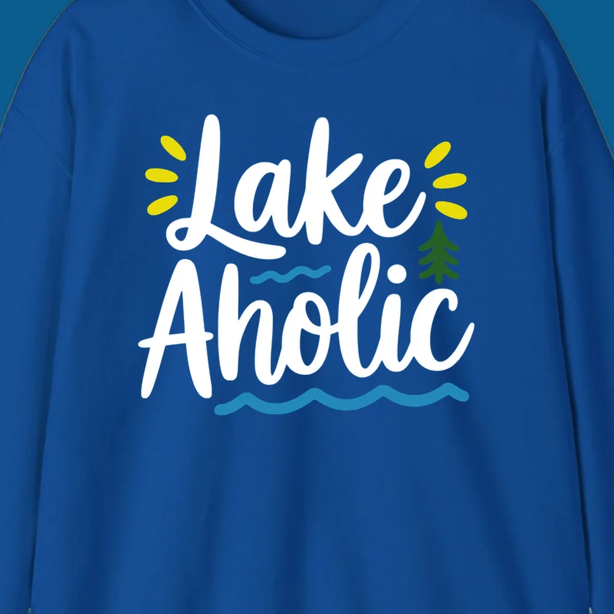 Lakeaholic text design with sun rays, pine tree, and water waves.