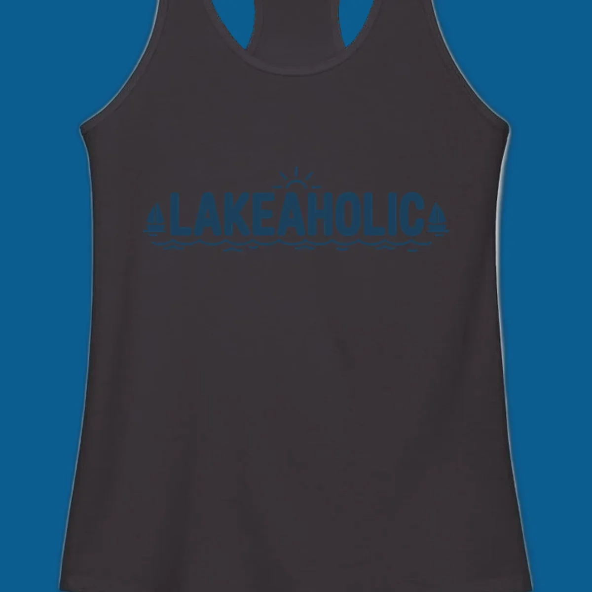 Lakeaholic typography with sun, sailboats, and waves graphic.
