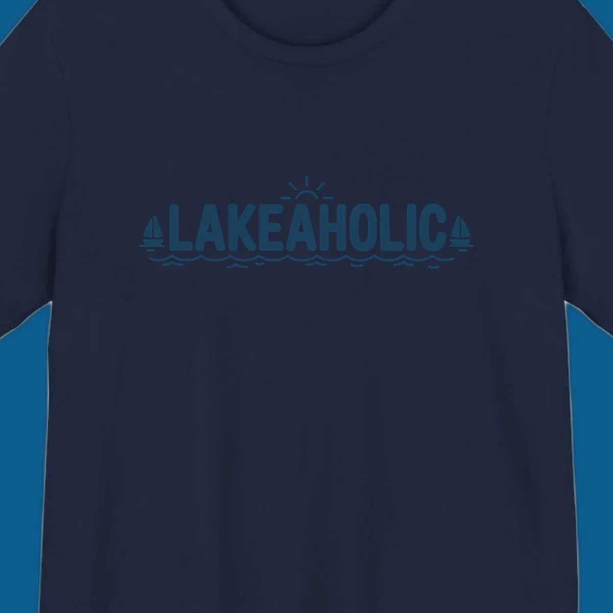 Lakeaholic typography with sun, sailboats, and waves graphic.