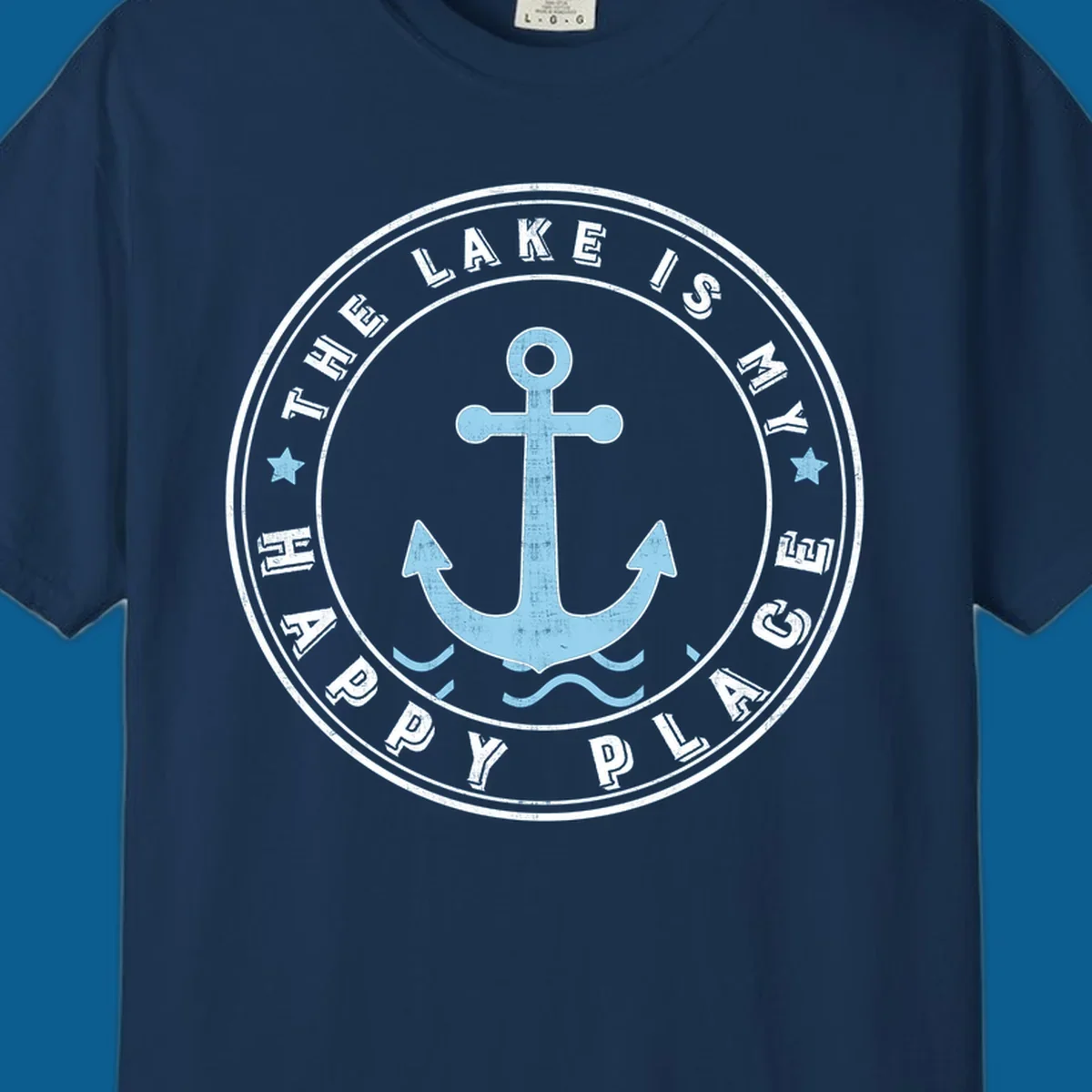 Circular badge with anchor and text 'The Lake Is My Happy Place', lake-happy-place concept.