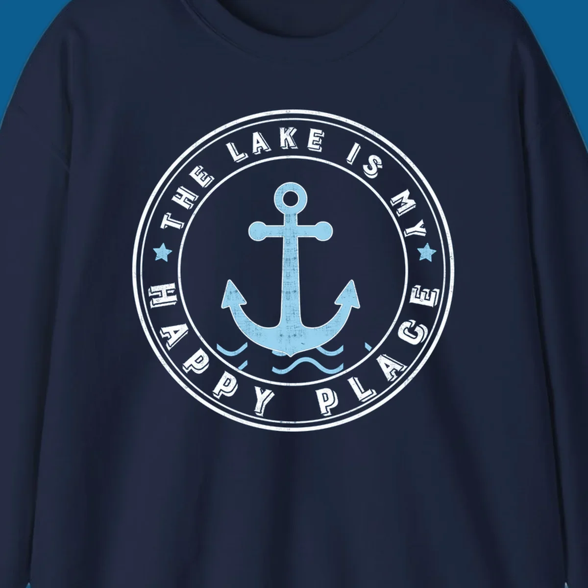 Circular badge with anchor and text 'The Lake Is My Happy Place', lake-happy-place concept.