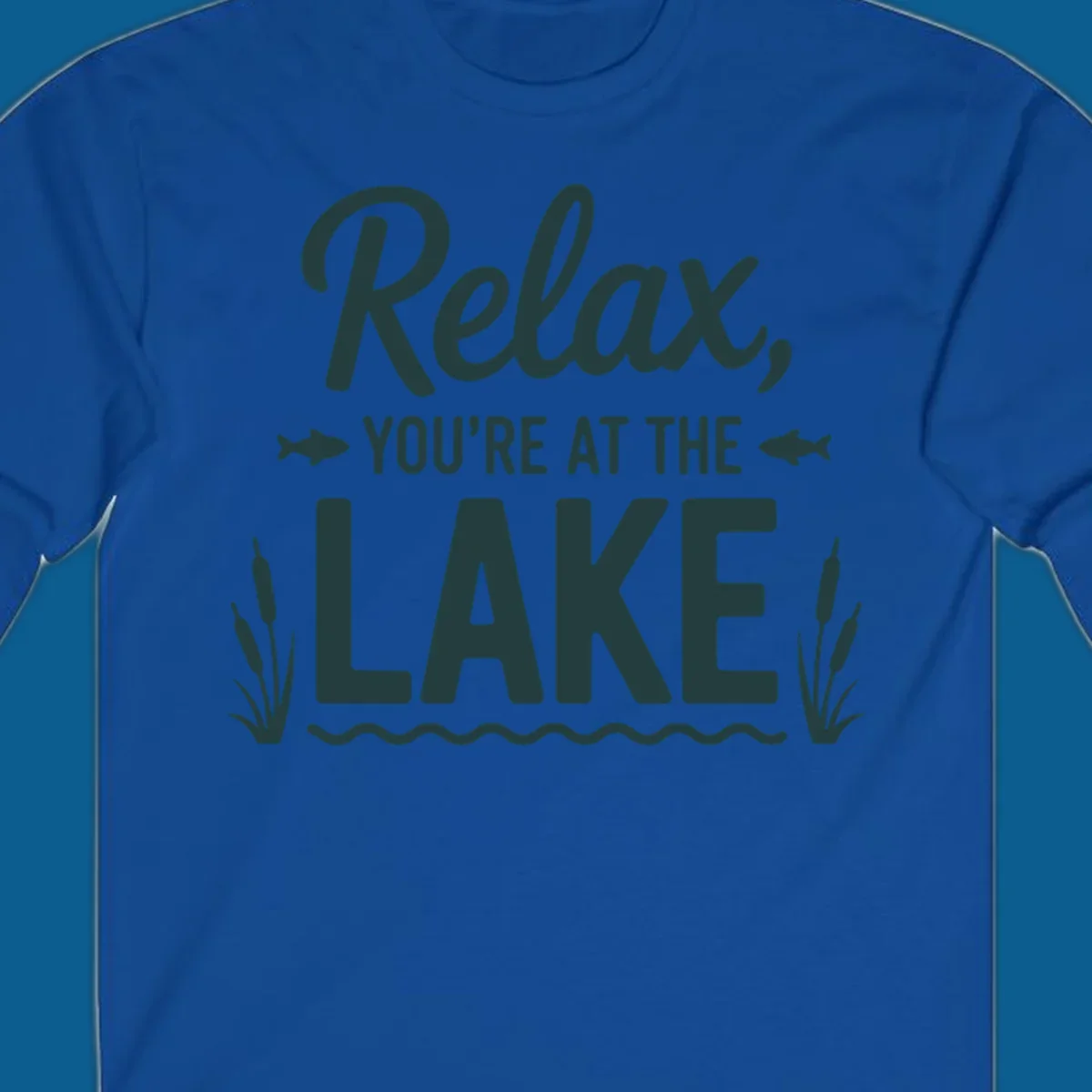 Relax you're at the lake typographic design with fish and cattails.