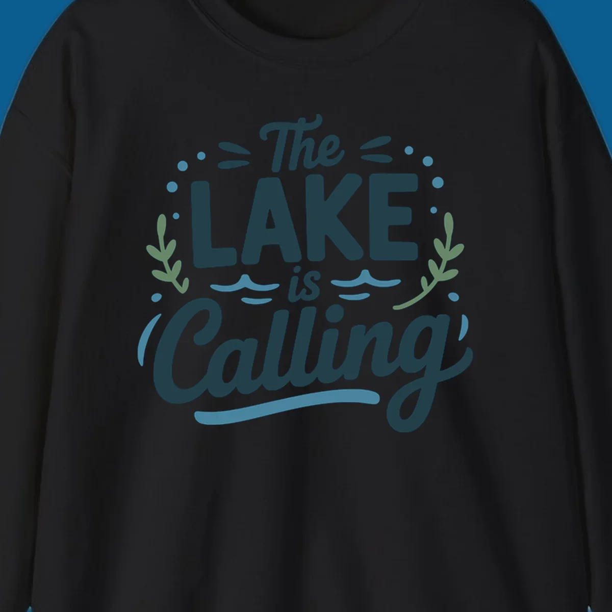 The Lake Is Calling text design with wave and leaf graphics