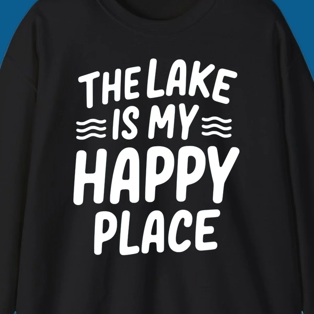 The lake is my happy place typography design with wavy lines.
