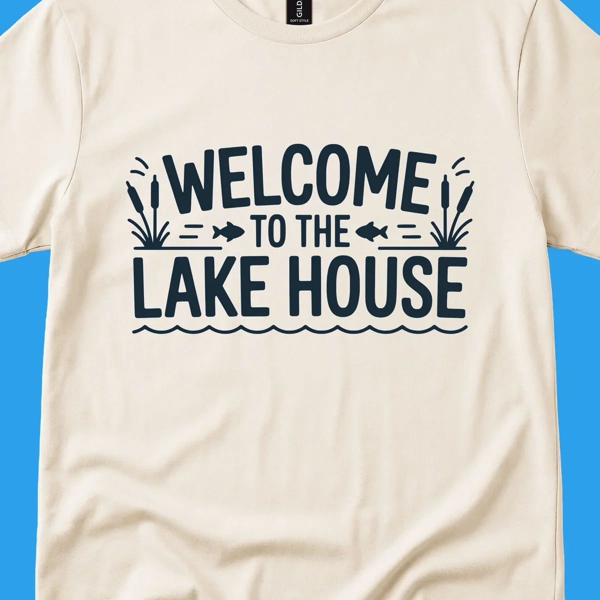 Dark blue text 'WELCOME TO THE LAKE HOUSE' with fish and reeds, for lake house welcome.