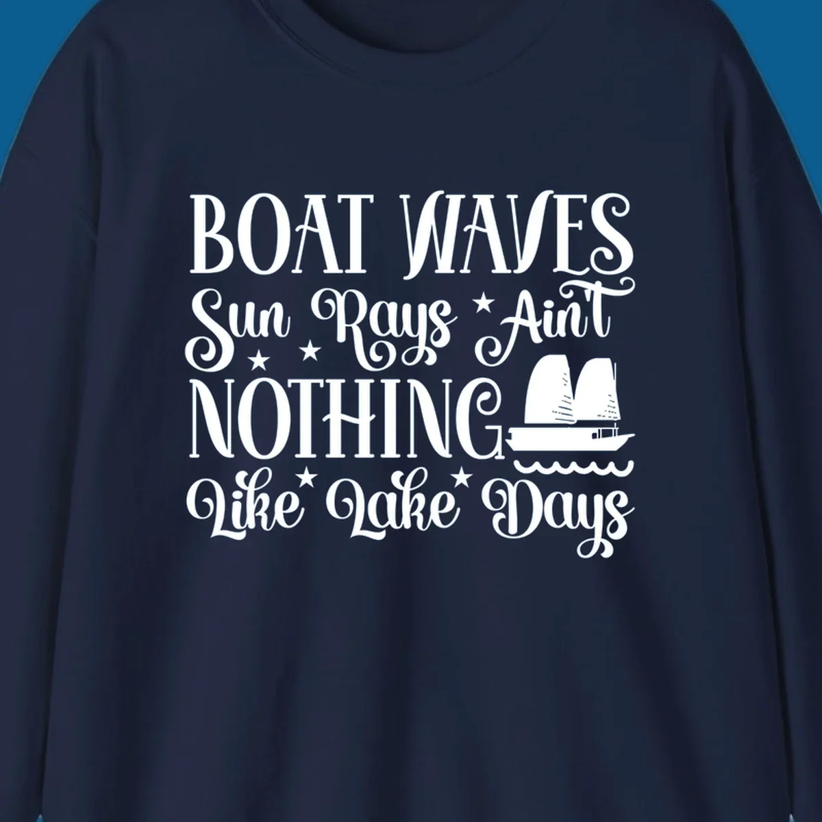 Boat waves, sun rays, nothing like lake days text with sailboat and waves.
