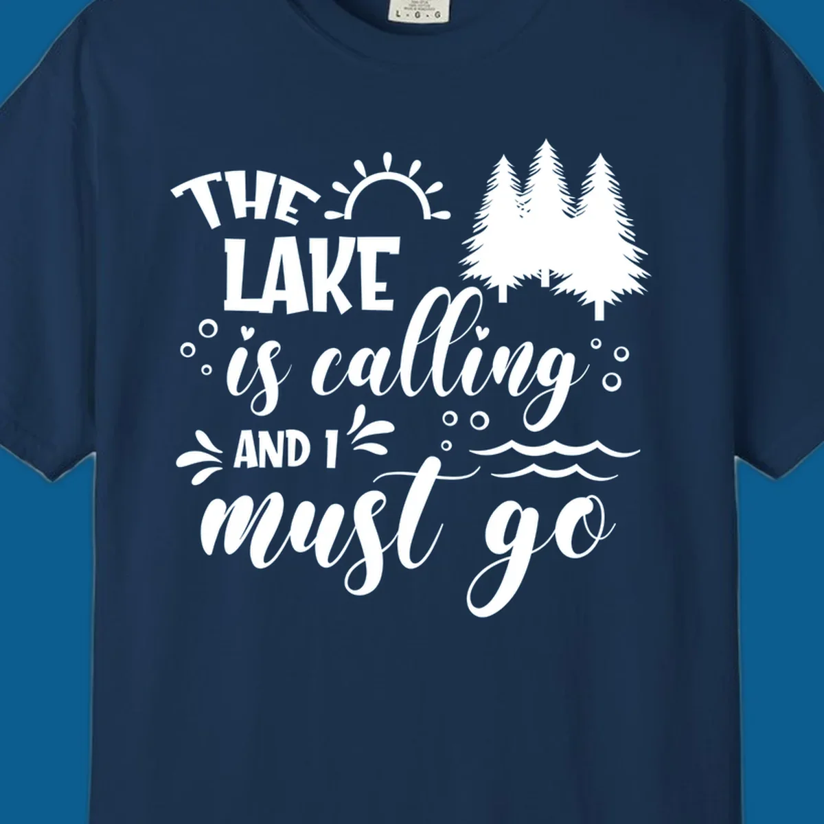 Typography design with 'The Lake Is Calling And I Must Go' phrase and nature elements, for lake life enthusiasts.
