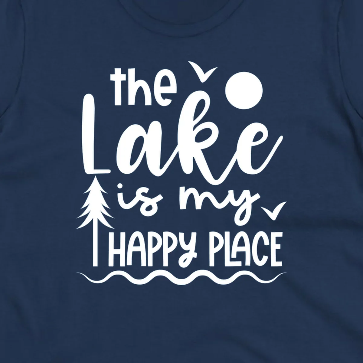 The Lake Is My Happy Place text design with lake elements like a tree, sun, and birds.