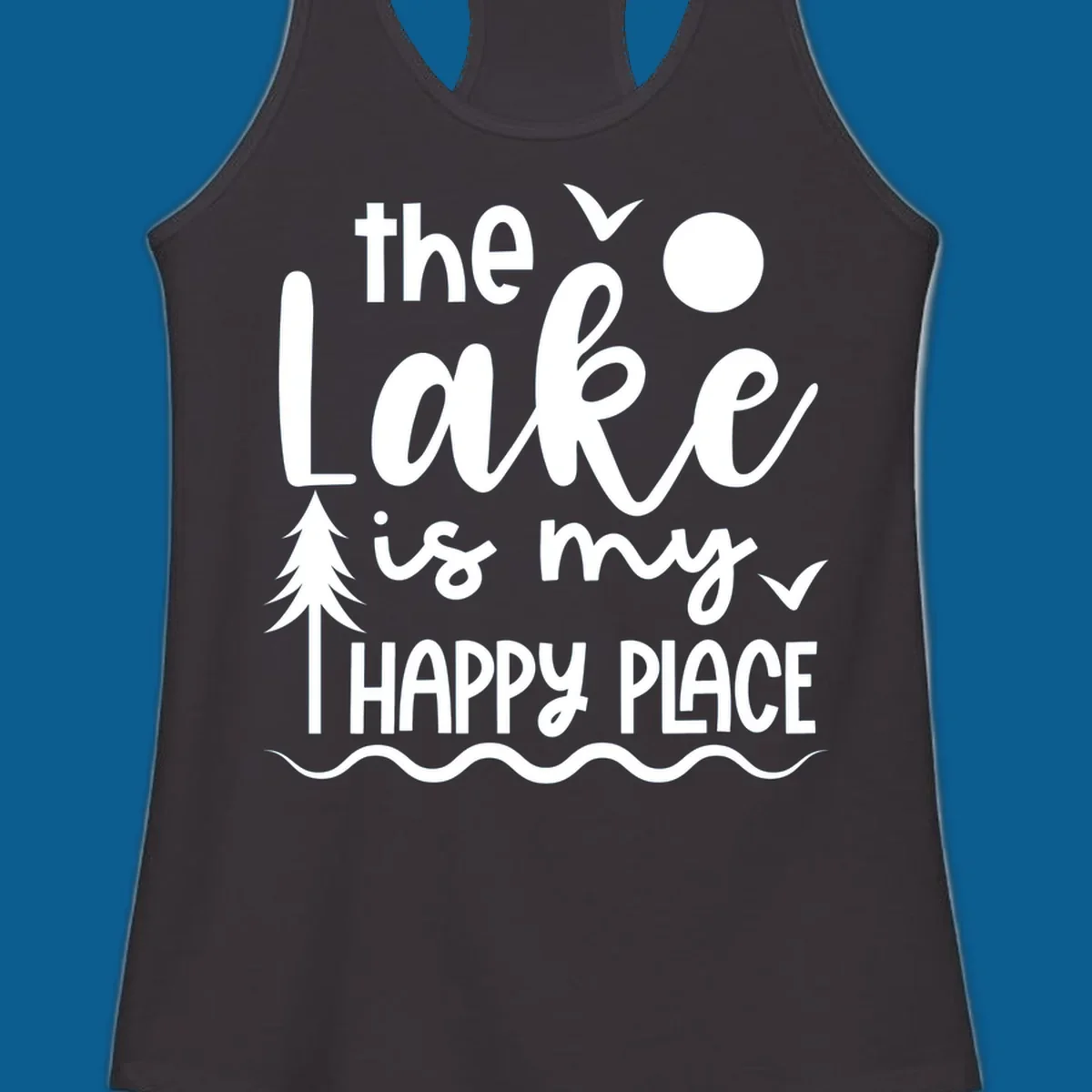 The Lake Is My Happy Place text design with lake elements like a tree, sun, and birds.
