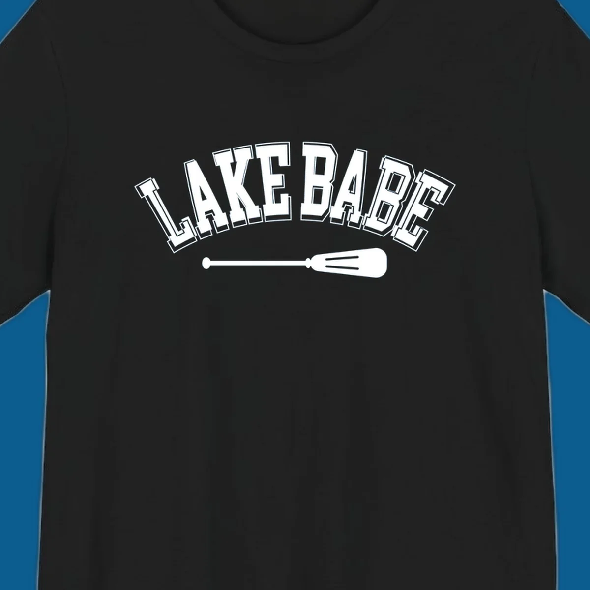 Arched text 'LAKE BABE' with an oar illustration below, representing lake-babe-style.