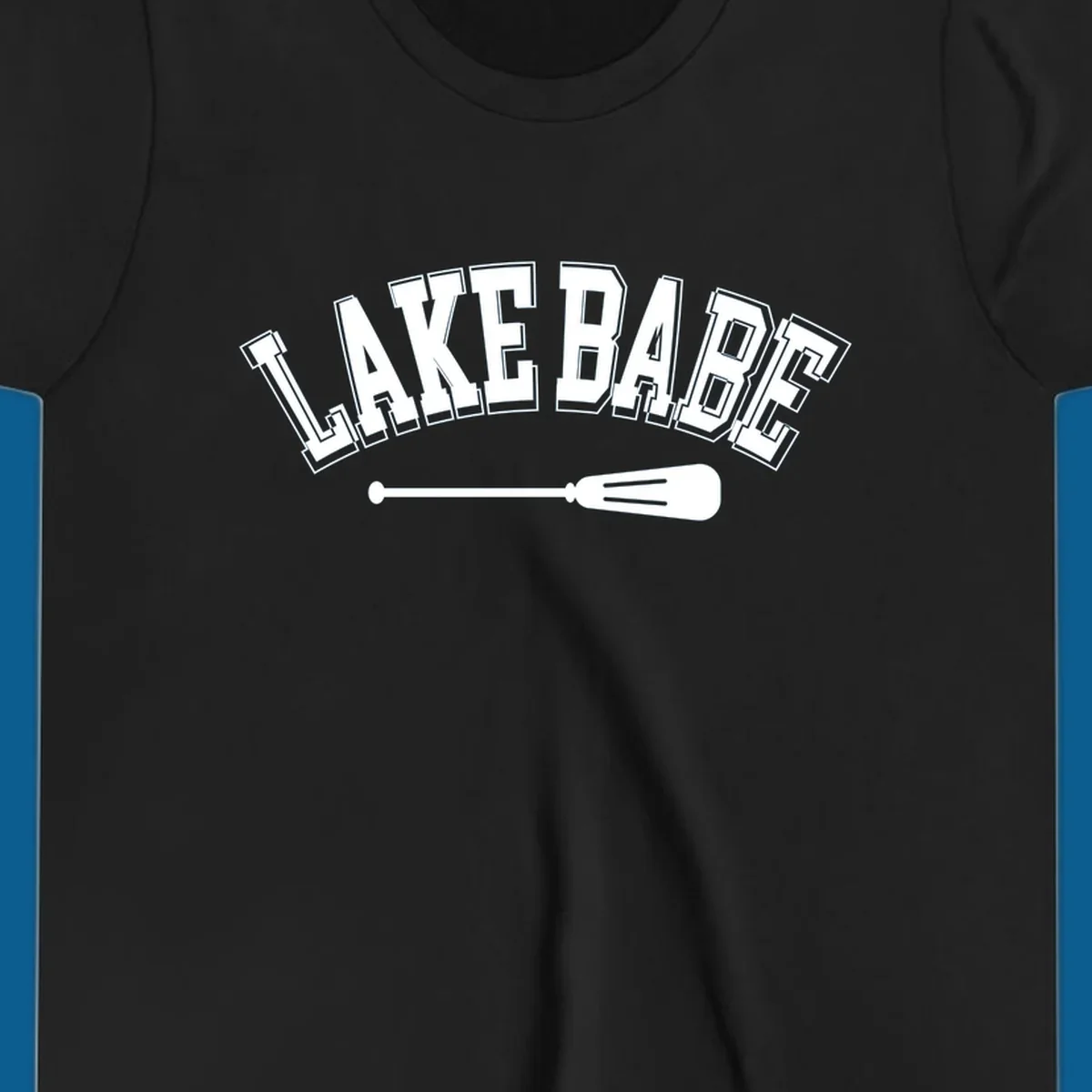 Arched text 'LAKE BABE' with an oar illustration below, representing lake-babe-style.