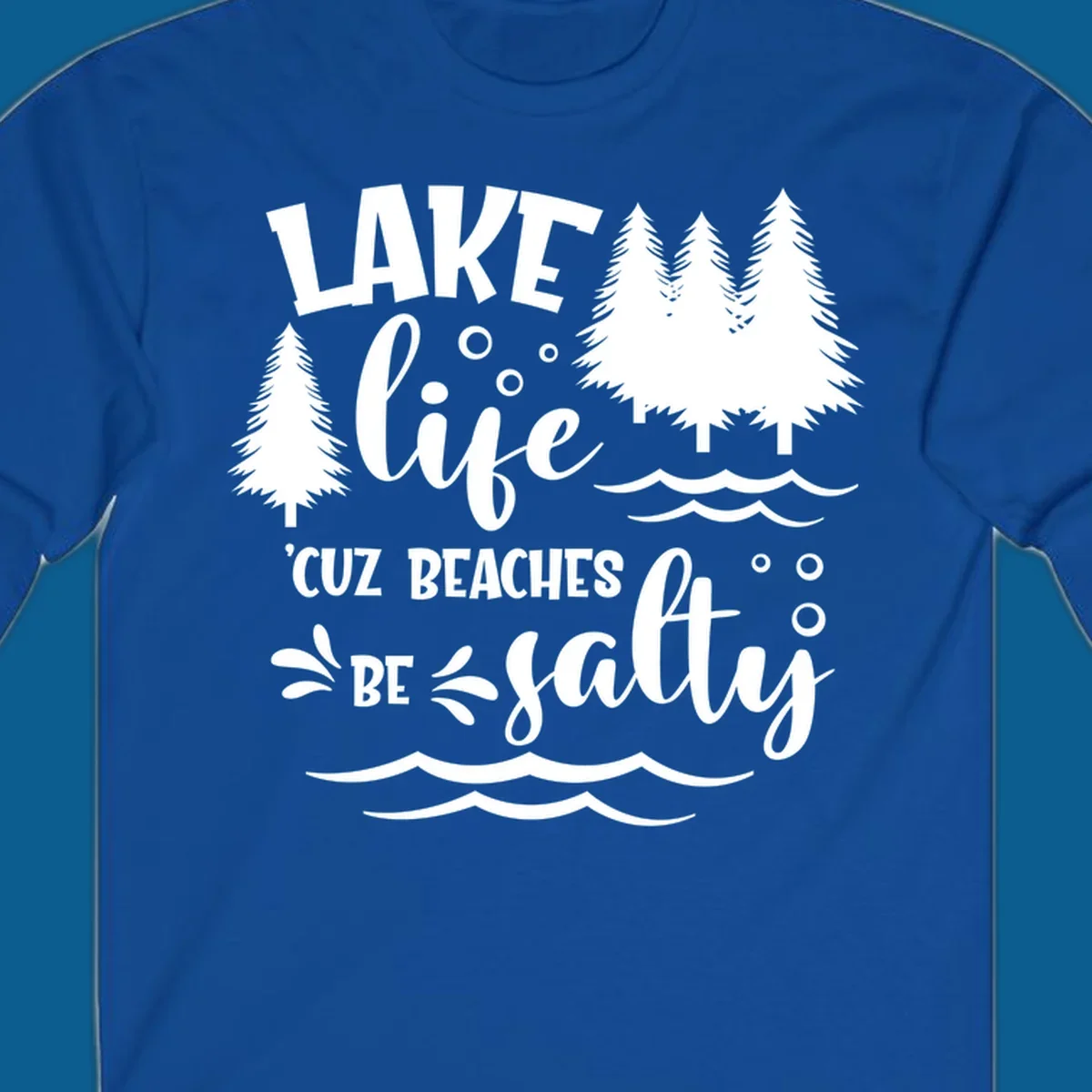 Lake life graphic with text 'LAKE life 'CUZ BEACHES BE salty', pine trees, and water waves.