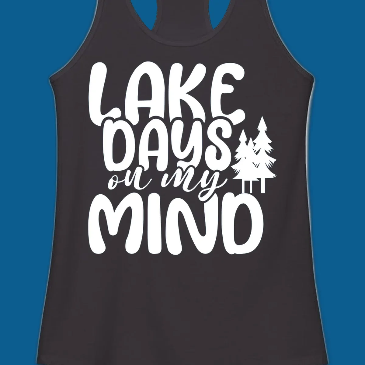 Lake days on my mind graphic with pine trees