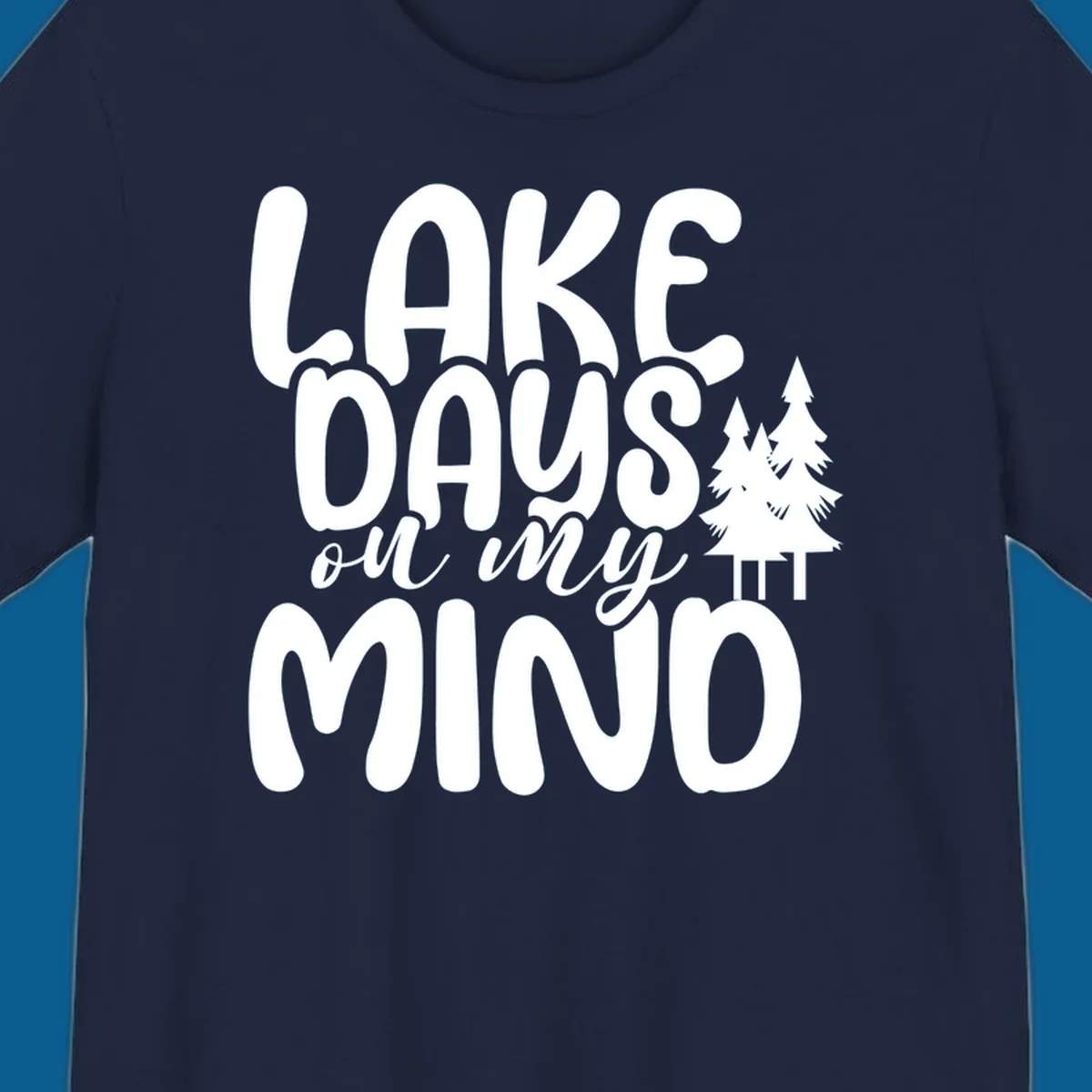Lake days on my mind graphic with pine trees