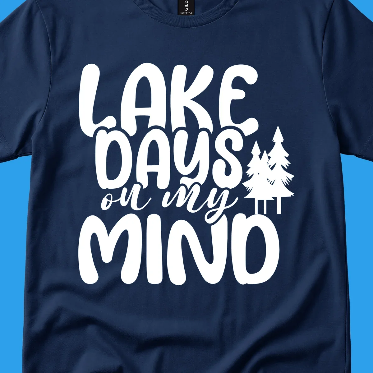 Lake days on my mind graphic with pine trees