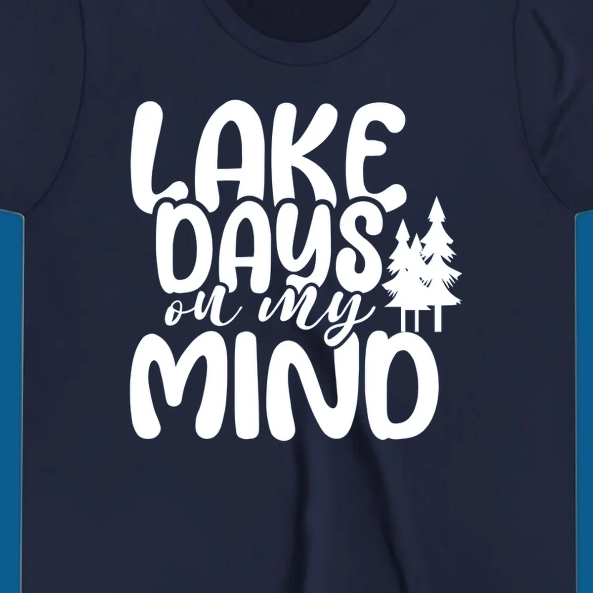 Lake days on my mind graphic with pine trees