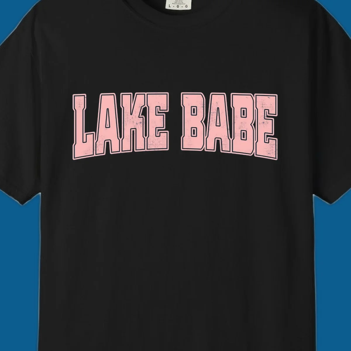 Lake Babe text design in pink with distressed texture and black outline.