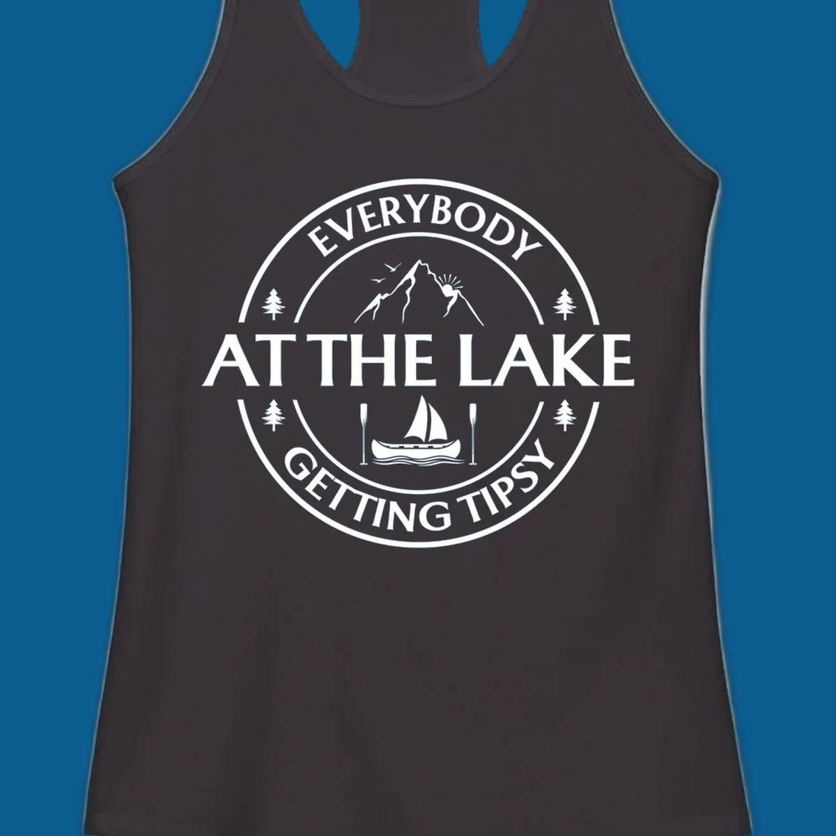 Circular badge design for lake life featuring mountains, canoe, and text 'Everybody At The Lake Getting Tipsy'.
