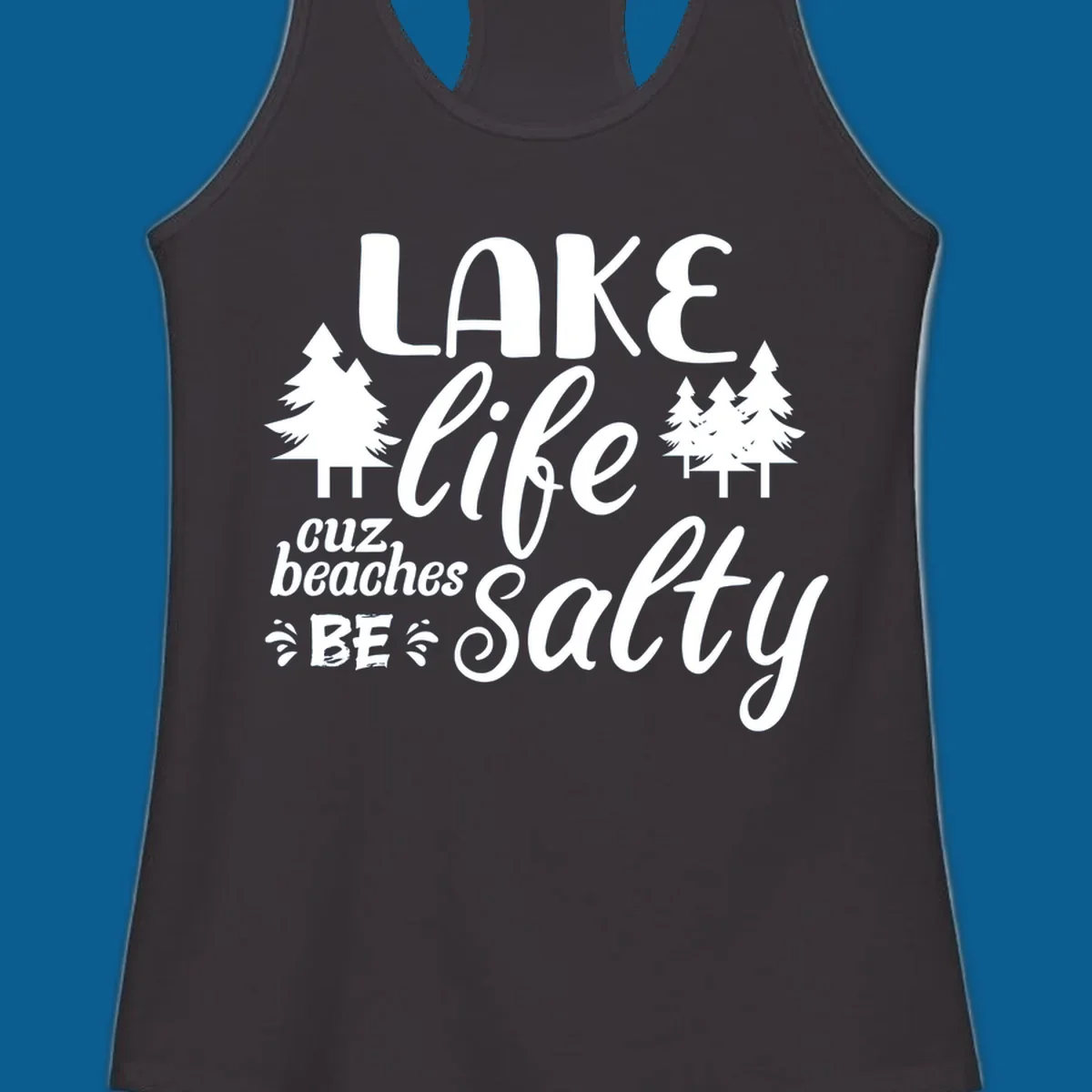 Lake life cuz beaches be salty text and pine trees graphic.