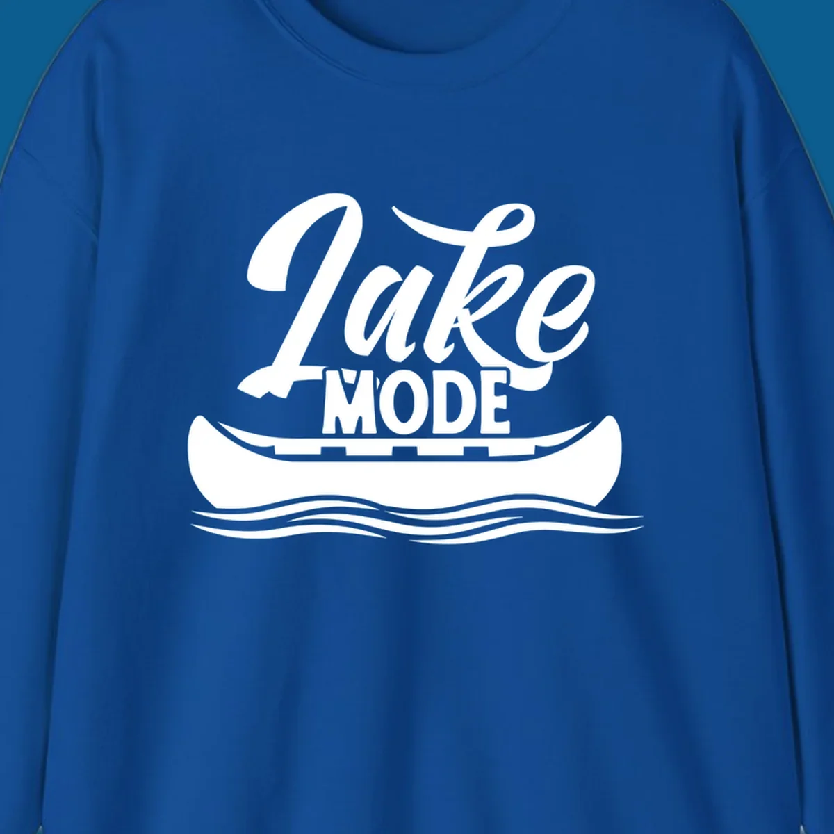 Lake Mode text with canoe and water waves graphic. lake-mode-canoe
