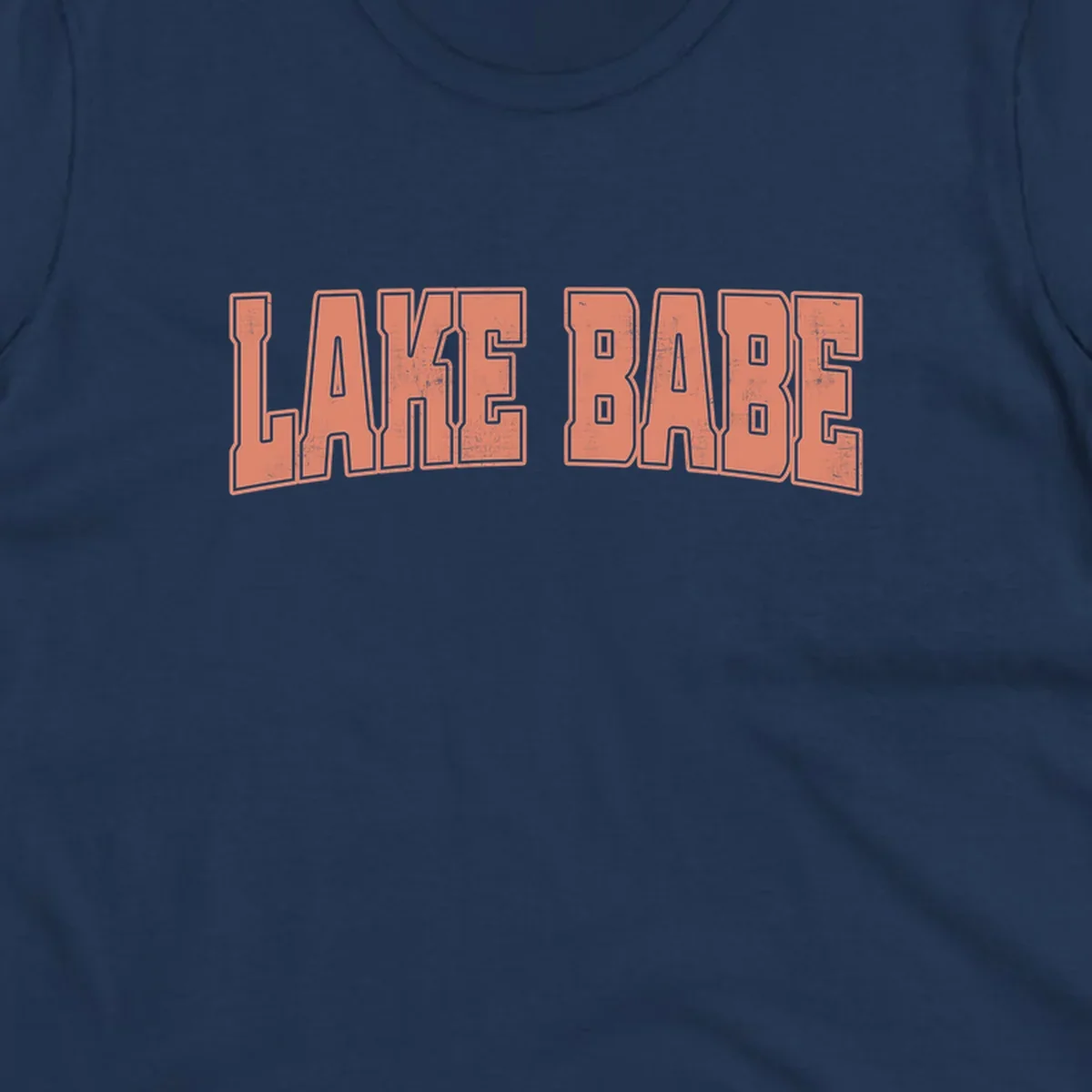 Lake Babe text in coral with distressed texture and thick outline, on black and white backgrounds.