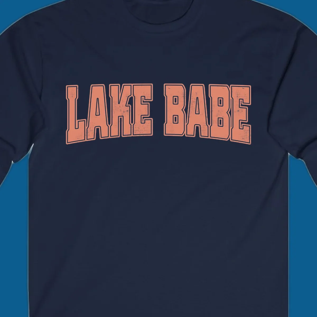 Lake Babe text in coral with distressed texture and thick outline, on black and white backgrounds.