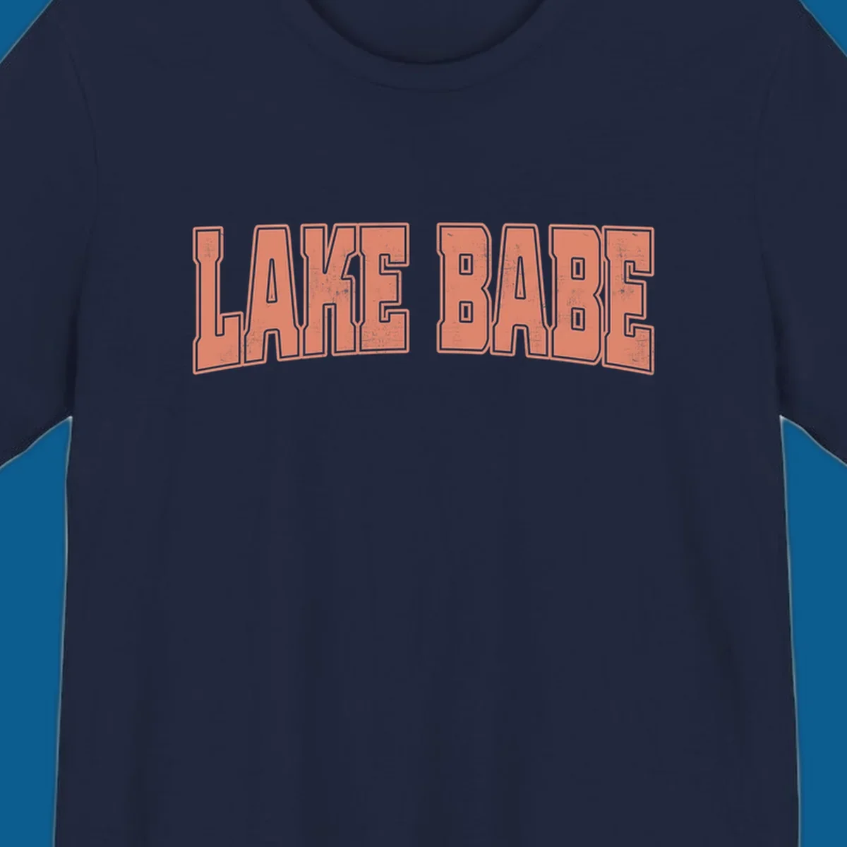 Lake Babe text in coral with distressed texture and thick outline, on black and white backgrounds.