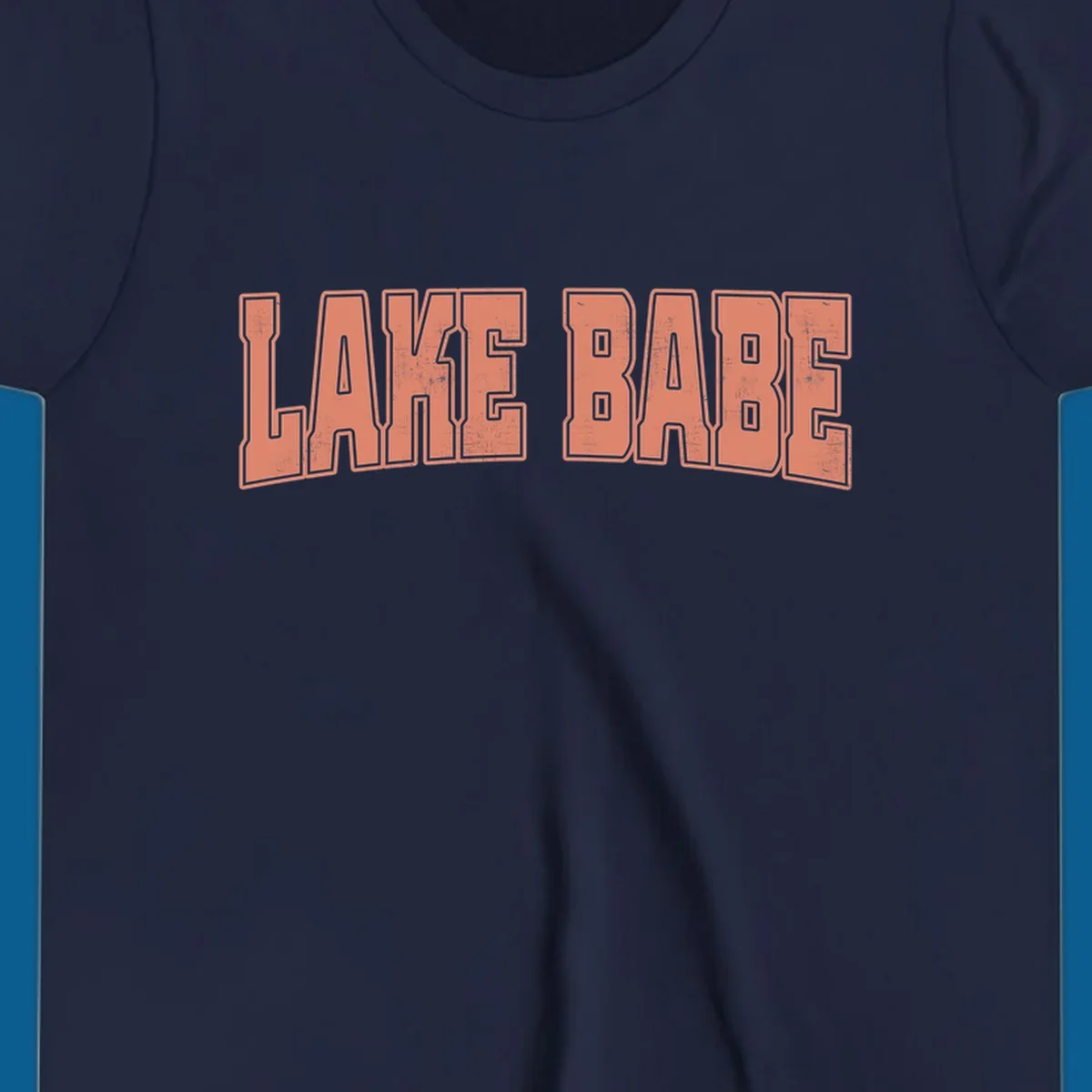 Lake Babe text in coral with distressed texture and thick outline, on black and white backgrounds.