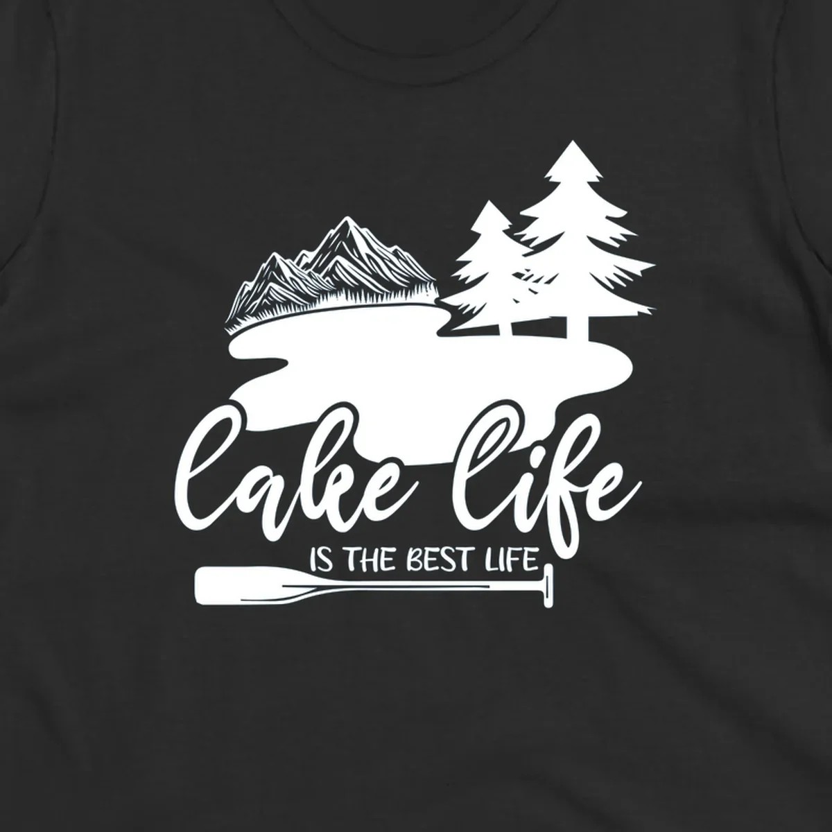 Lake life is the best life design with mountains, trees, lake, and paddle graphic.