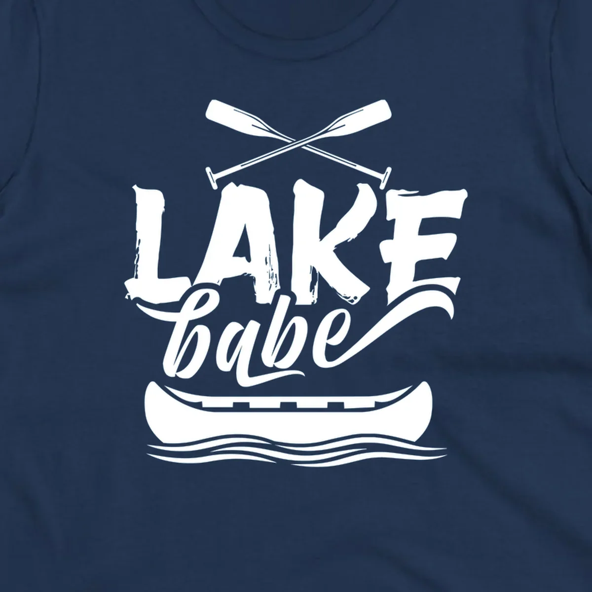 Lake babe text with canoe and oars on water. Primary keyword: lake-babe-canoe