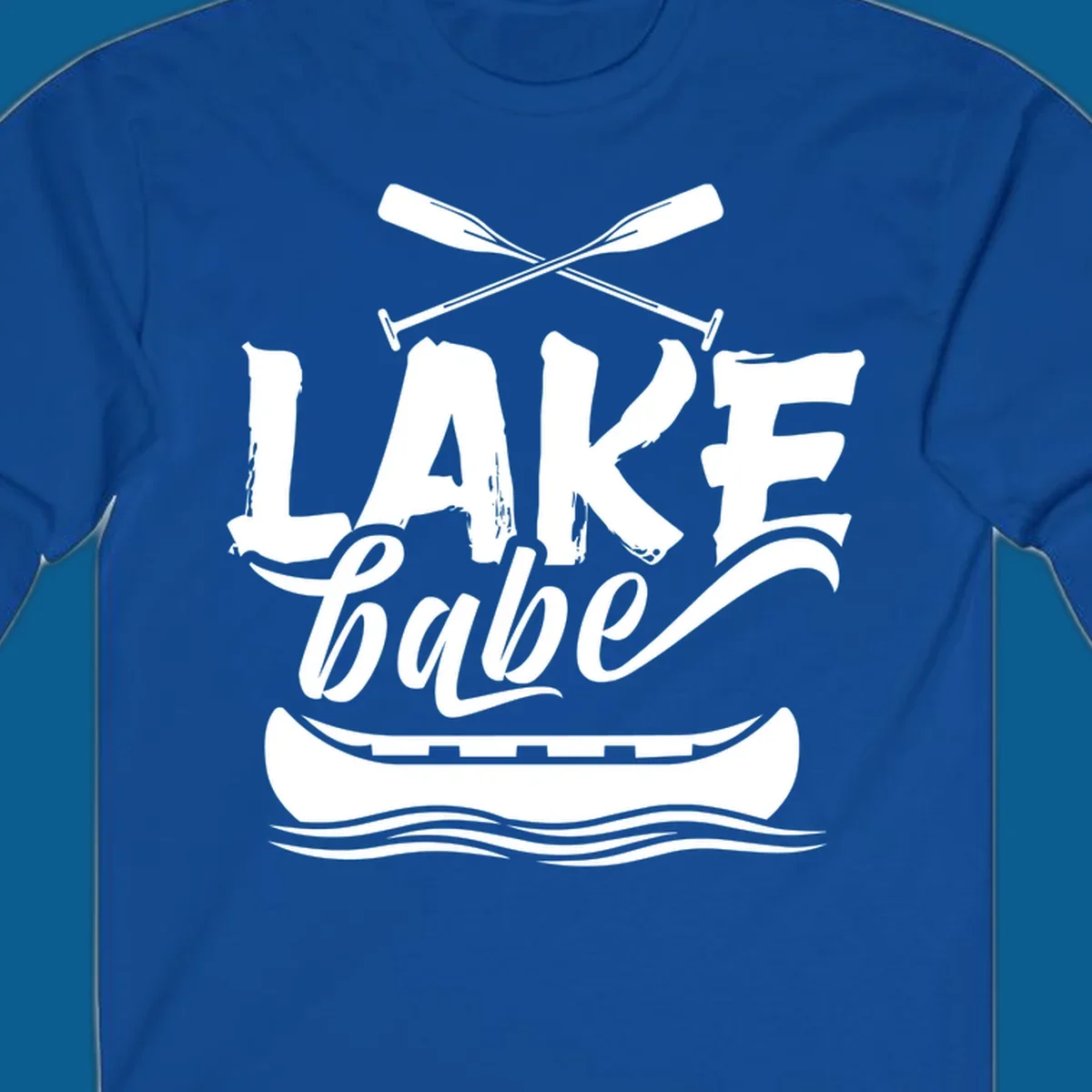 Lake babe text with canoe and oars on water. Primary keyword: lake-babe-canoe